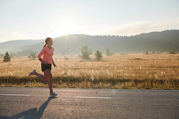 Determined Dawn: Confident and Motivated Athlete Embarks on Sunrise Run.