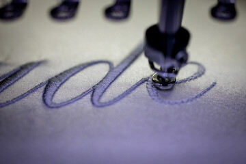 Inscription bride with grey thread. Wedding day preparation. Elegant bridal lingerie. White...