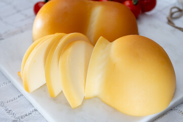 Cheese collection, Italian cheese scamorza, caciocavallo, provolone made from cow milk in South...