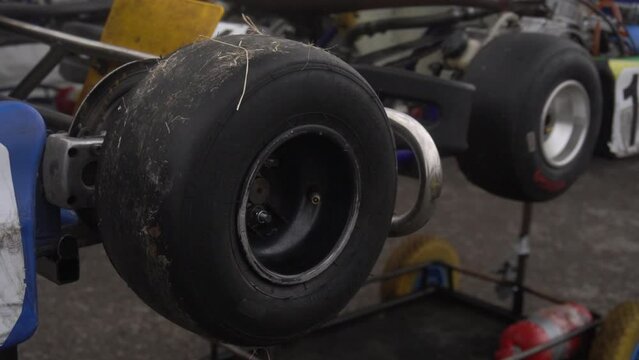 Preparing a racing kart car for the race. Spinning wheel close up