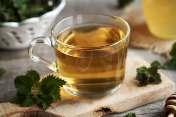 Nettle tea in a glass cup