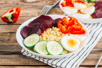Healthy Buddha bowl with millet and beets