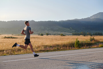 Determined Stride: Athletic Man Embarks on Marathon Preparation with Resolve.