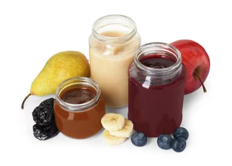 Fotobehang Jars with healthy baby food, blueberries, prunes and fresh fruits isolated on white © New Africa