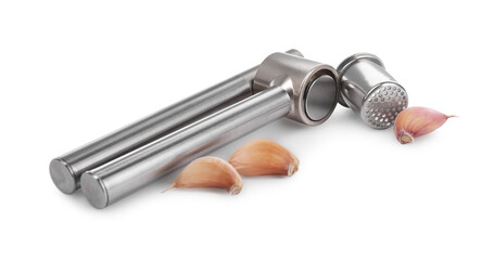 One metal garlic press and cloves isolated on white