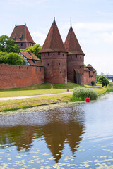 Naklejka na ściany i meble 13th century Malbork Castle, medieval Teutonic fortress on the River Nogat, Malbork, Poland