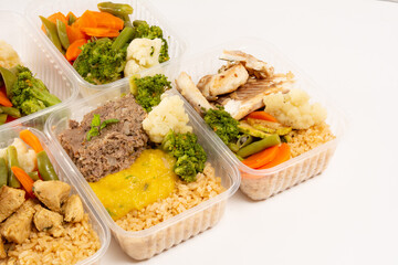 Healthy packed lunch box home prepared meal in front top view clean white background front view