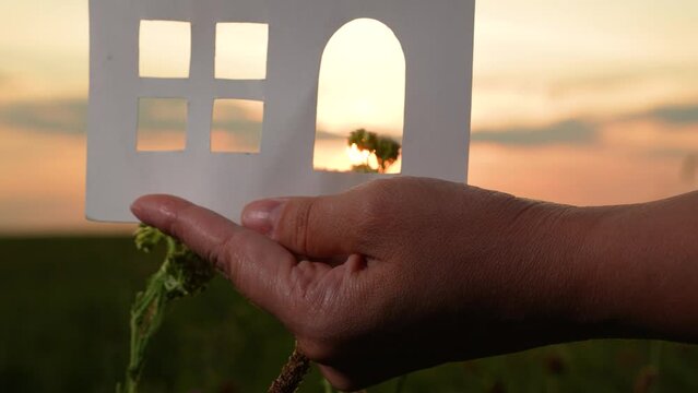 hands holding paper house, window sunset ray, happy family mortgage build new house, housewarming party ideas, mortgage rates today, house hunting mistakes, housing loan eligibility, mortgage interest