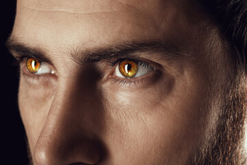 Captivating gaze. Man with rare eye color, closeup