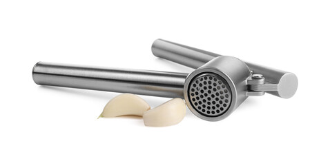 One metal garlic press and cloves isolated on white - obrazy, fototapety, plakaty