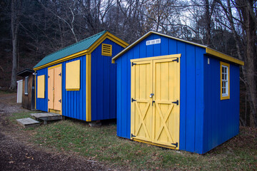 Naklejka premium Wooden Blue Sheds with Yellow Doors in Brattleboro, Vermont