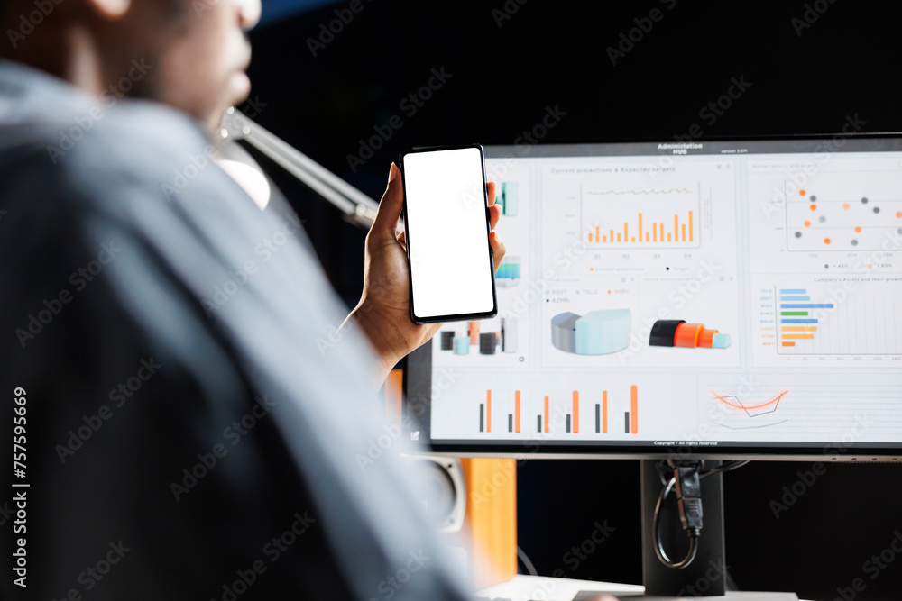 Aufkleber african american guy looks at white blank display while he works on financial operations with sales 