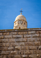 Fototapeta na wymiar Bell Tower of Abbey of the Dormition of Benedictine Order in Jerusalem, Israel