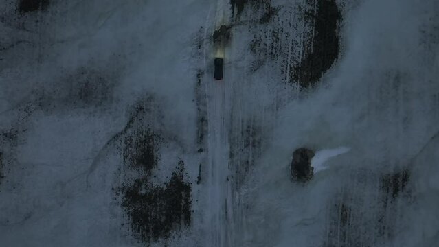 Aerial video on a Jeep Rubicon in a snowy area on the roads of Iceland in winter