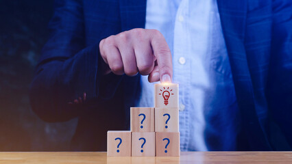 Question marks and light bulb symbolizing idea or solution, Problem solving skill, creativity,...