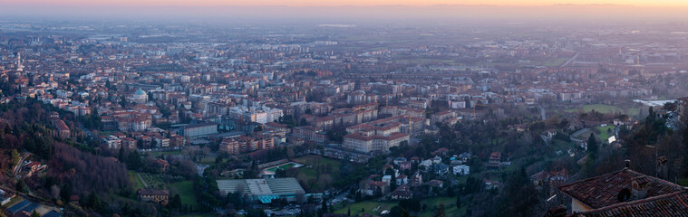 Panoramic view of cityscape Bergamo, aerial view to the city in the mountain valley, Lombardy, Italy.