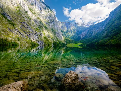 Obersee, in the background the Hagengebirge and the Roeth waterfall, Schoenau am Koenigssee, Berchtesgaden National Park, Berchtesgadener Land, Upper Bavaria, Bavaria, Germany, Europe