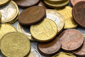Euro coins scattered on the table as a background 1
