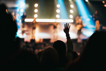 Crowd at concert, Hand lifted up in worship, Praise and worship