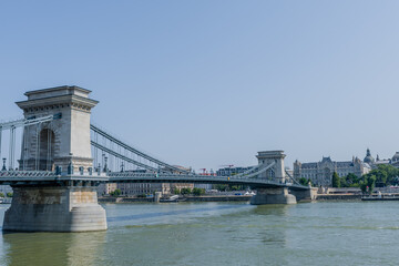 The Chain Bridge over the Danube River with clear skies in Budapest, Hungary