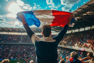 Fototapeta premium Exhilarated fan with the French flag at stadium
