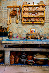 typical mexican kitchen full of utensils and dishes