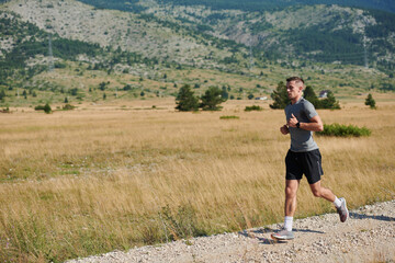 A dedicated marathon runner pushes himself to the limit in training.