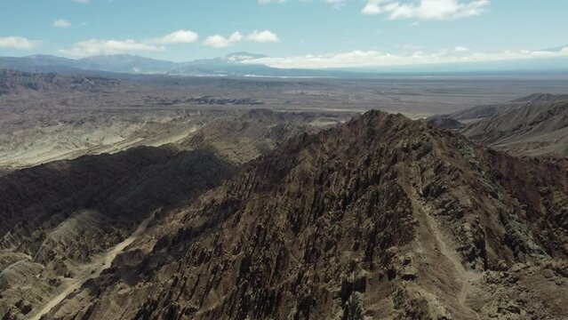 Thrust fault geology: Flyover rugged rock Canon del Indio in Argentina