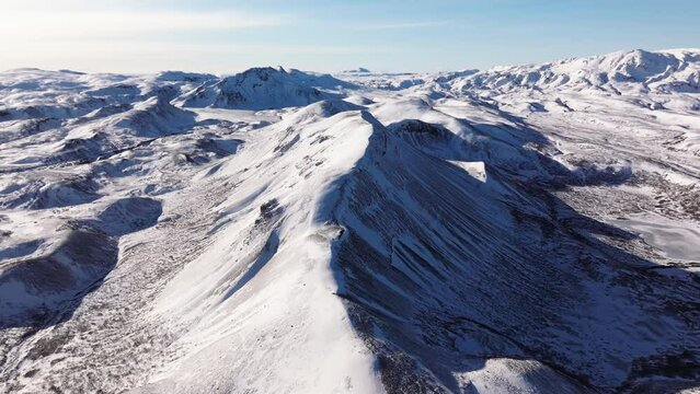 Aerial video over National Iceland Thingvellir in a snowy winter.