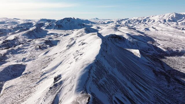 Aerial video over National Iceland Thingvellir in a snowy winter.