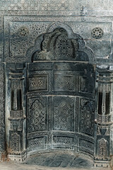 wall designs curved details clicked in a historical mosque of Adina in India