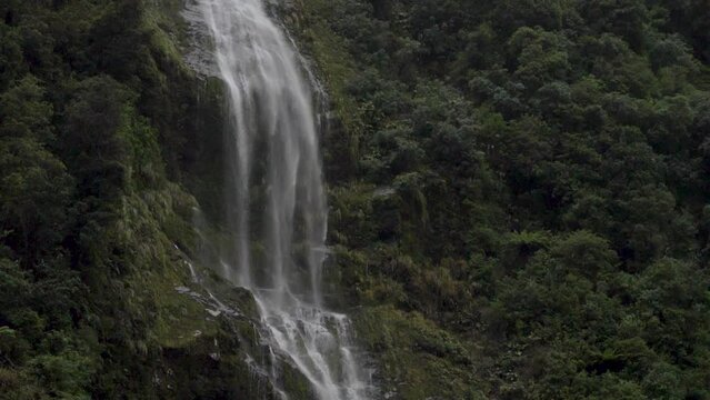 Slow Motion static footage of a three-pronged waterfall in Doubtful Sound - Patea, New Zealand