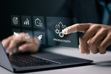 Fototapeta na wymiar Process to increase productivity concept. Businessman use laptop with productivity icon for industrial management in efficiency and efficient process. Lean cost and productivity growth.