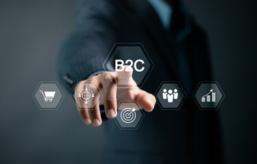 B2C, Business to customer marketing strategy concept. Business strategy, communication, feedback, online marketing and E-commerce marketing strategy. Businessman touch B2C icon on virtual screen.