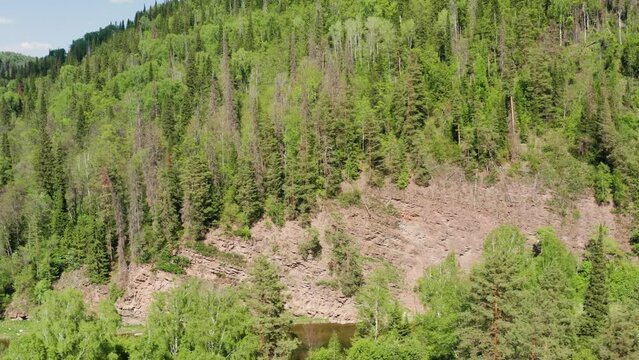 The Southern Urals in summer, the Zilim River in the Kultamak natural boundary. Aerial view.