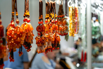 Beautiful and delicate amber pendant close-up