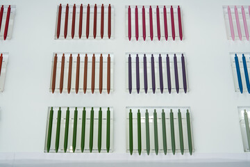Neatly arranged colorful watercolor pens sold in a stationery store