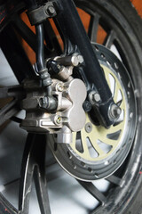 close up of motorcycle disc brakes