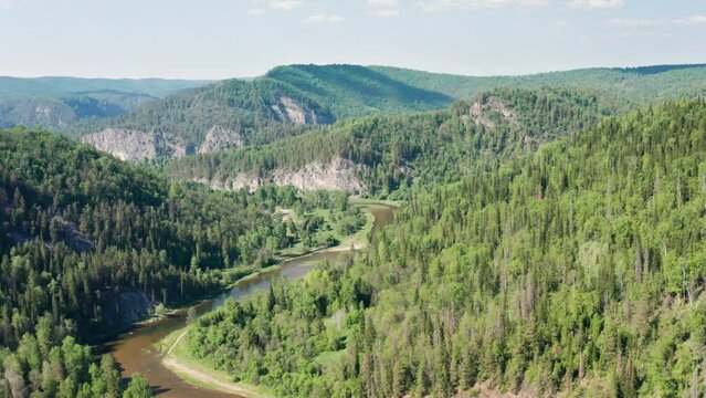 Southern Urals, the Zilim River and the Kuzganak Rock. Aerial view.