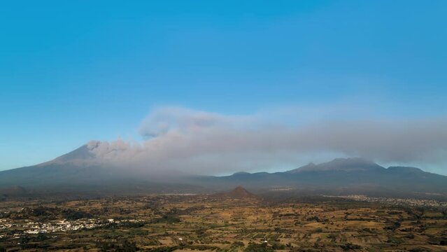 Panoramic view of the Iztaccihuatl and Popocatepetl volcanoes.