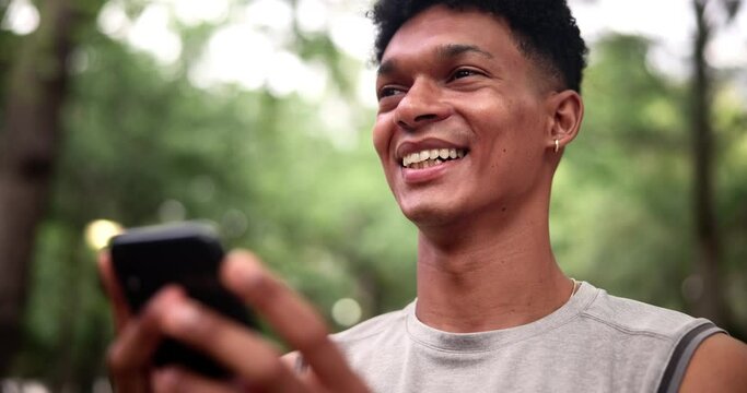 Phone, laughing and fitness man in a park with social media, chat or location search in nature. Smartphone, app and male runner in a forest with online comic, joke or meme, text and gif communication