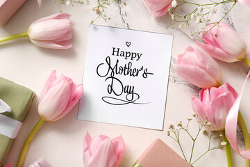 Card with text HAPPY MOTHER'S DAY, gift boxes and beautiful flowers on light background