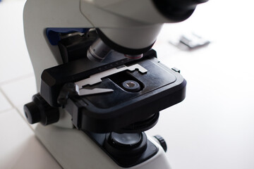 Microscope photographs in incognito laboratory. Concept of science and research.