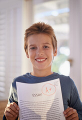 Child, portrait and paper exam for education learning or student essay in home or scholarship,...