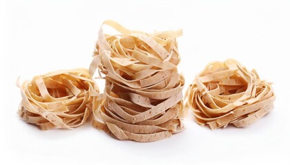 Whole grain pasta tagliatelle isolated on a white background. Heap of Tagliatelle integral,