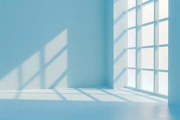 A room with a window casting shadows on a light blue wall, creating a minimalist and abstract atmosphere for product presentation