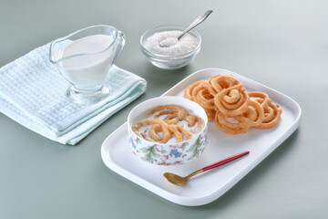 Jalebi with milk is a delicious and healthy snack. Jalebi is a unsweetened fried snack prepared with wheat flour and then dipped in thick sugar syrup. But in ramadan jalebi use with warm milk in sehr