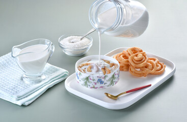 Jalebi with milk is a delicious and healthy snack. Jalebi is a unsweetened fried snack prepared with wheat flour and then dipped in thick sugar syrup. But in ramadan jalebi use with warm milk in sehr