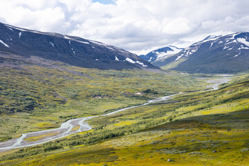 A beautiful summer landscape with Rapa river Rapadalen in Sarek National Park in Sweden. A mountain...