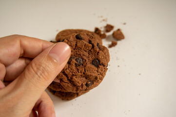 sweet and crunchy chocolate biscuits on a white background